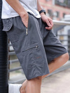 Pantalones cortos casuales para hombre, hechos de 100 %, con bolsillos con cremallera y una cintura ajustable con cordón|B0GGHC2X35